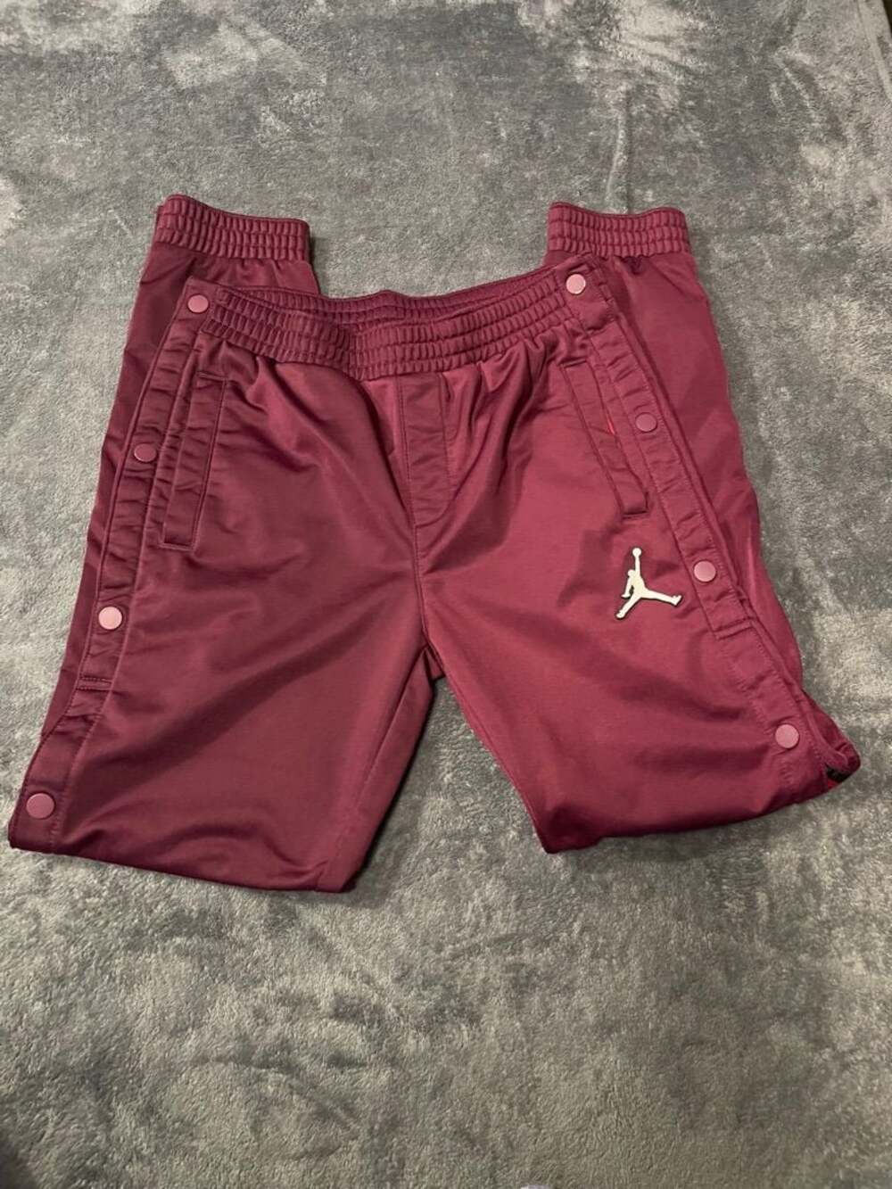 Jordan Brand Maroon Snap-Button Tear-Away Track Pants. In boys' size large.